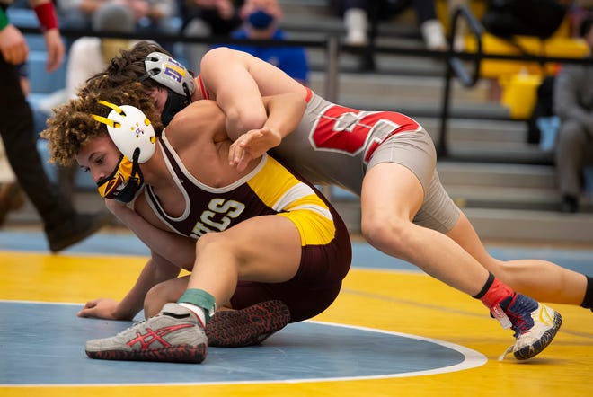 Smyrna's Gabe Giampietro (right) and Milford's Trevor Copes wrestle in the 113 pound championship match at the DIAA State Individual Wrestling Championship at Cape Henlopen High School Wednesday, March 3, 2021.