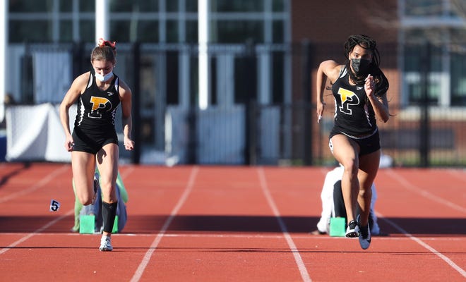 Padua's Jia Anderson (right) wins her second state title of the afternoon - leaving teammate Juliana Balon to settle for second in the 55 meter dash during the DIAA state indoor track and field championships at Dover High School Wednesday, March 3, 2021.
