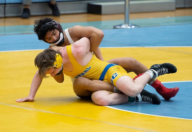 Caravel's Ethan Gray (top) and Sussex Central's Mason Ankrom wrestle in the 138 pound championship match at the DIAA State Individual Wrestling Championship at Cape Henlopen High School Wednesday, March 3, 2021.